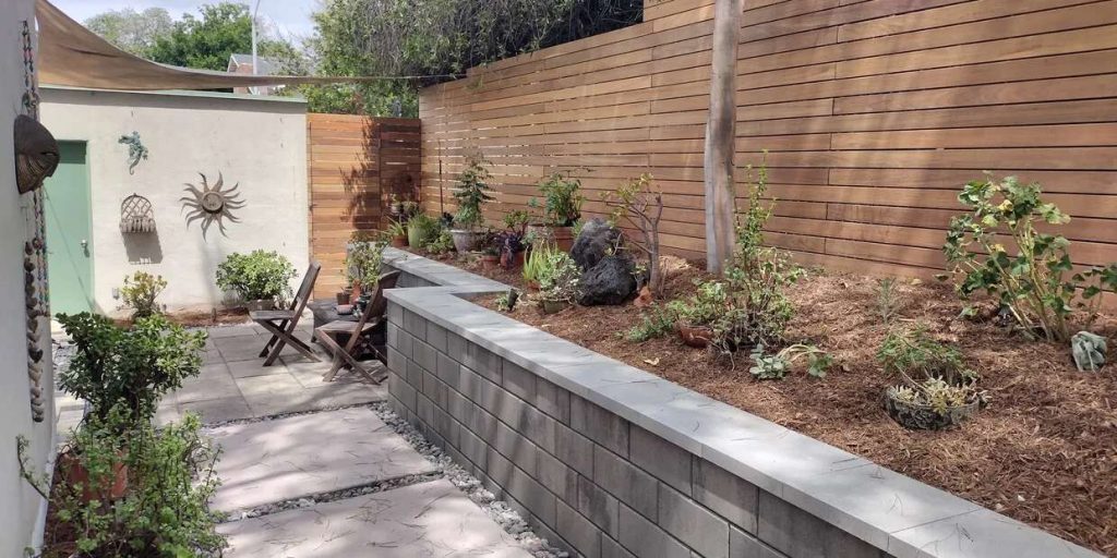 Renovated outdoor living space by Wilson Woodscape