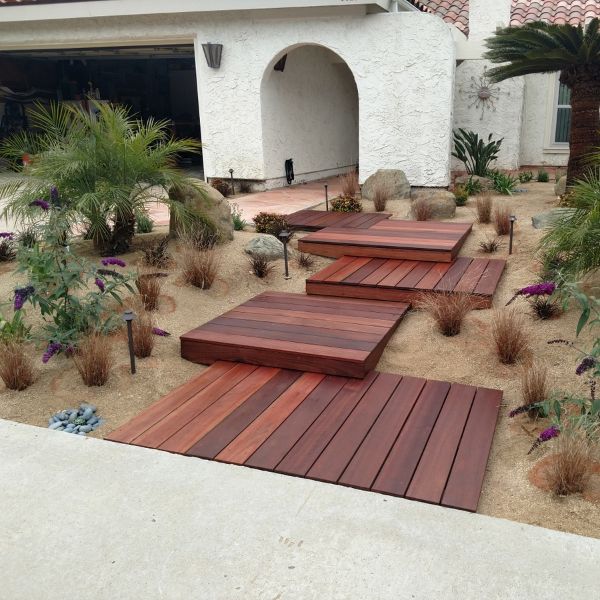 Renovated outdoor living space by Wilson Woodscape